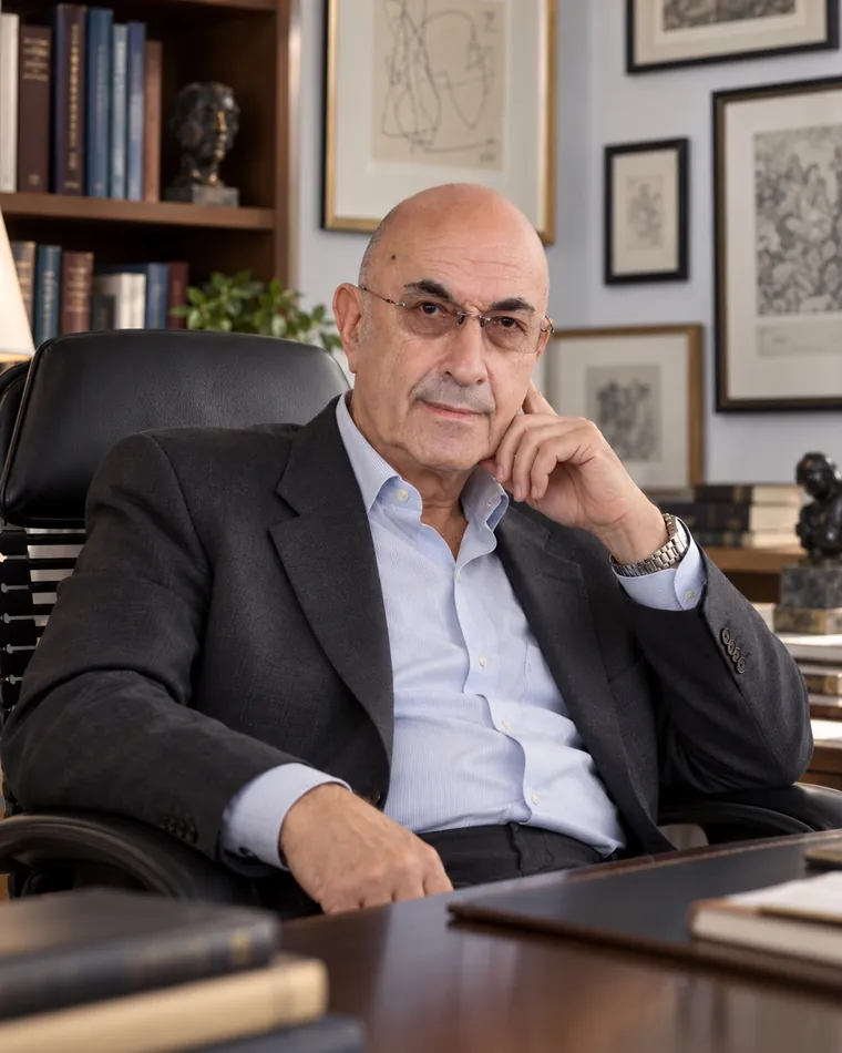 Elkhonon Goldberg, Ph.D., at his desk in his office